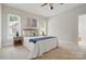 Cozy bedroom with natural light and calming blue accents at 2805 Sadler Rd, Alexis, NC 28006