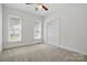 Bedroom with two windows and double closets at 2805 Sadler Rd, Alexis, NC 28006