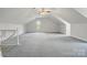 Spacious bonus room with dormer window and cozy carpet at 2805 Sadler Rd, Alexis, NC 28006