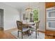 Charming breakfast nook with a round table and natural light at 2805 Sadler Rd, Alexis, NC 28006