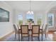 Bright dining room with large windows and comfortable seating at 2805 Sadler Rd, Alexis, NC 28006
