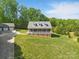 Beautiful brick house with a detached garage and a large grassy yard at 2805 Sadler Rd, Alexis, NC 28006