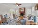 Bright living room featuring a fireplace and comfortable seating, perfect for relaxation at 2805 Sadler Rd, Alexis, NC 28006