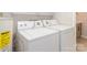 Convenient laundry area showcasing a matching washer and dryer set at 3210 Selwyn Farms Ln # 7, Charlotte, NC 28209