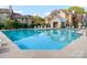 Community pool with lounge chairs, perfect for relaxation and enjoyment at 3210 Selwyn Farms Ln # 7, Charlotte, NC 28209