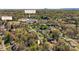 An aerial view of a neighborhood in a wooded area with a school and park nearby at 3846 22Nd Ne St, Hickory, NC 28601