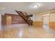 Basement with brick accent wall and staircase at 3846 22Nd Ne St, Hickory, NC 28601