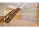 Open basement with a staircase and light wood flooring at 3846 22Nd Ne St, Hickory, NC 28601