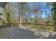 Spacious wooden deck with railings, perfect for outdoor entertaining or enjoying the peaceful surroundings at 3846 22Nd Ne St, Hickory, NC 28601