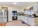 Bright kitchen featuring white cabinetry, stainless steel appliances, and a window over the sink at 3846 22Nd Ne St, Hickory, NC 28601