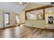 Bright and airy living area with wood floors, natural light, and seamless flow to other rooms at 3846 22Nd Ne St, Hickory, NC 28601