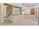 Open-concept room with brick fireplace and wood beams, filled with natural light for a warm, inviting space at 3846 22Nd Ne St, Hickory, NC 28601