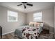Cozy bedroom featuring wood-look floors, neutral colors, and comfortable furnishings at 396 Tower Rd, Vale, NC 28168