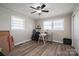 Bedroom featuring wood-look floors, a ceiling fan, and a neutral color scheme at 396 Tower Rd, Vale, NC 28168