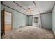 Bedroom featuring a ceiling fan, window with curtains, and carpet at 404 Forest Winds Dr, Salisbury, NC 28144