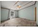 Light blue bedroom with a window, ceiling fan, and carpet at 404 Forest Winds Dr, Salisbury, NC 28144