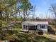 Exterior view of the home with covered porch and mature trees at 404 Forest Winds Dr, Salisbury, NC 28144