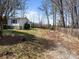 Charming single-story home with vinyl siding and a spacious, tree-lined yard at 404 Forest Winds Dr, Salisbury, NC 28144