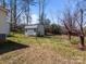 View of the backyard outbuilding with metal roof and durable siding at 404 Forest Winds Dr, Salisbury, NC 28144
