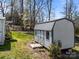Backyard outbuilding with metal roof, windows and painted siding at 404 Forest Winds Dr, Salisbury, NC 28144