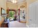 Inviting foyer with open doorway leading to outdoor view and adjacent office space at 4071 King Wilkinson Rd, Lincolnton, NC 28092