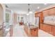 Well-lit kitchen with island, stainless steel appliances, and adjacent dining area at 4071 King Wilkinson Rd, Lincolnton, NC 28092