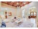 Spacious living room featuring hardwood floors, neutral decor, and abundant natural light at 4071 King Wilkinson Rd, Lincolnton, NC 28092