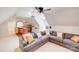 Large living room with a wet bar, comfortable sectional, and a ceiling fan at 4071 King Wilkinson Rd, Lincolnton, NC 28092