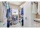 Walk-in closet with built-in shelving, shoe racks and ample storage space at 4071 King Wilkinson Rd, Lincolnton, NC 28092