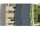 A top-down aerial view of the roof, driveway, and landscaping at 408 Moondance Dr # C, Gastonia, NC 28054