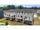 A townhome backyard featuring a deck, patio, and outdoor living space at 408 Moondance Dr # C, Gastonia, NC 28054