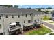A townhome backyard featuring a deck, patio, and outdoor living space at 408 Moondance Dr # C, Gastonia, NC 28054