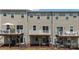 A townhome backyard featuring a deck, patio, and outdoor living space at 408 Moondance Dr # C, Gastonia, NC 28054