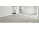 Expansive basement with neutral carpet, ready for personalization and various uses at 408 Moondance Dr # C, Gastonia, NC 28054