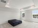 Bright bedroom with a tray ceiling and large windows offering a pleasant view at 408 Moondance Dr # C, Gastonia, NC 28054