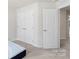 Spare bedroom showcasing closet space and neutral walls and carpet at 408 Moondance Dr # C, Gastonia, NC 28054