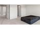 Carpeted bedroom with neutral walls, open doors and a modern mattress on the floor at 408 Moondance Dr # C, Gastonia, NC 28054