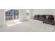 Bright living room featuring a sliding glass door to the backyard and neutral walls and carpet at 408 Moondance Dr # C, Gastonia, NC 28054