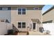 Private backyard with a white fence, patio area, and a cozy spot for outdoor dining at 423 Wescott St # 73, Indian Trail, NC 28079