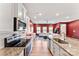 Well-equipped kitchen with granite counters, subway tile backsplash, and an open layout to the living area at 423 Wescott St # 73, Indian Trail, NC 28079
