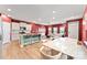 Spacious living area featuring an open floor plan, hardwood floors, and abundant natural light at 423 Wescott St # 73, Indian Trail, NC 28079