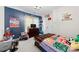 Well-furnished bedroom with a Minecraft theme and ample space for relaxation and play at 4380 Timberwood Dr, Gastonia, NC 28052