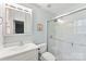 Modern bathroom featuring tiled shower and contemporary fixtures and lighting at 4522 Woods End Ln, Charlotte, NC 28277