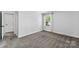 Brightly lit bedroom with soft carpet and white trim at 4522 Woods End Ln, Charlotte, NC 28277