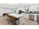 Kitchen with a large island, stainless steel appliances, and a view to the dining area at 4522 Woods End Ln, Charlotte, NC 28277