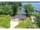 Lake Norman home featuring a sprawling lawn, wooded area, and stunning lake views at 4980 Kiser Island Rd, Terrell, NC 28682