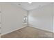Well-lit bedroom with carpet floors and a window with natural light at 4980 Kiser Island Rd, Terrell, NC 28682