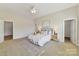 Neutral bedroom with a comfortable bed and a carpeted floor at 4980 Kiser Island Rd, Terrell, NC 28682