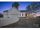 Charming home with a well-maintained lawn, attached two car garage, and a covered front porch at 4980 Kiser Island Rd, Terrell, NC 28682
