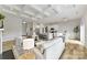 Bright open-concept living room and kitchen with coffered ceilings at 4980 Kiser Island Rd, Terrell, NC 28682